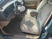 ✅ 1997 Ford Crown Victoria • VIN: 2FALP73W3VX232351 • Lot: 60196655. Wystawiony na Copart z przebiegiem 218 587 mil. Bezpłatny archiwum sprzedaży aukcyjnych z USA i szczegółowy raport historii pojazdu na DreamBid. Zdjęcie 7.