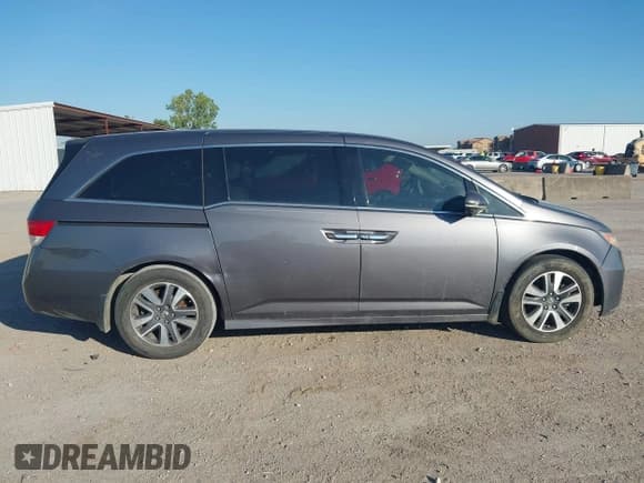 ✅ 2014 Honda Odyssey Touring • VIN: 5FNRL5H96EB009924 • Lot: 43390673. Listed on IAAI with 187,351 mi. Free auction sales archive from the USA and detailed vehicle history report at DreamBid. Image 13.