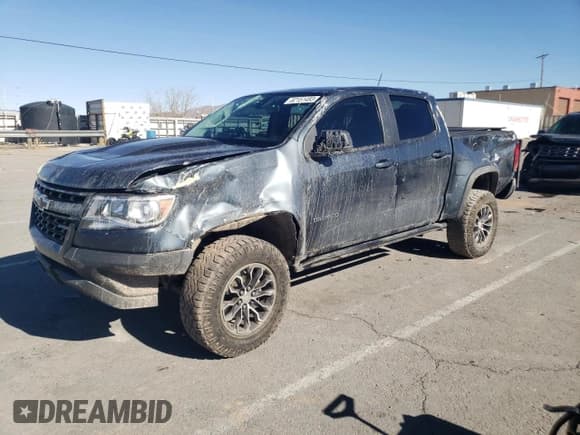 ✅ 2019 Chevrolet Colorado 4WD ZR2 • VIN: 1GCGTEENXK1338557 • Лот: 82151483. Опубликован ранее на Copart с пробегом 57 180 миль. Бесплатный доступ к архиву аукционных продаж из США и подробный отчёт об истории автомобиля на DreamBid. Изображение 1.