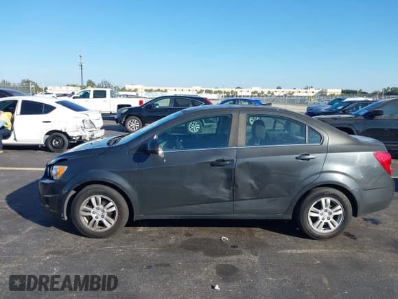 ✅ 2014 Chevrolet Sonic LT • VIN: 1G1JC5SH7E4188357 • Lot: 43746984. Listed on IAAI with 149,212 mi. Free auction sales archive from the USA and detailed vehicle history report at DreamBid. Image 14.