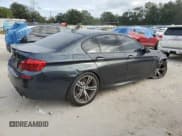 ✅ 2016 BMW M5 • VIN: WBSFV9C51GD595430 • Lot: 79675834. Listed on Copart with 82,351 mi. Free auction sales archive from the USA and detailed vehicle history report at DreamBid. Image 3.