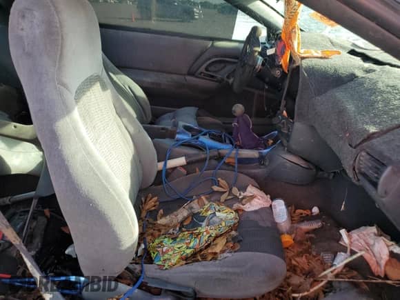 1999 Chevrolet Camaro z VIN 2G1FP22K4X2119705, wystawiony jako Copart lot #61094235 z przebiegiem Nie podano mil oraz Czysty tytuł • Clean title. Historia ofert i sprzedaży dostępna na DreamBid. Obrazek 10.