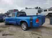 1999 Dodge Dakota Sport z VIN 1B7GL22Z7XS110023, wystawiony jako Copart lot #85889754 z przebiegiem Nie podano mil oraz Szkoda całkowita • Salvage title. Historia ofert i sprzedaży dostępna na DreamBid. Obrazek 2.