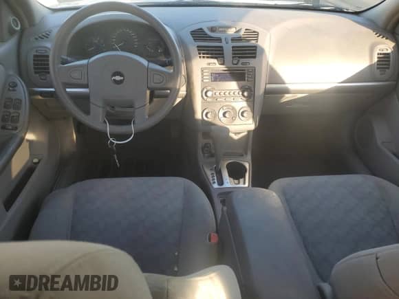 2004 Chevrolet Malibu LS z VIN 1G1ZT54824F240660, wystawiony jako Copart lot #77436794 z przebiegiem 191 987 mil mil oraz Szkoda całkowita • Salvage title. Historia ofert i sprzedaży dostępna na DreamBid. Obrazek 8.