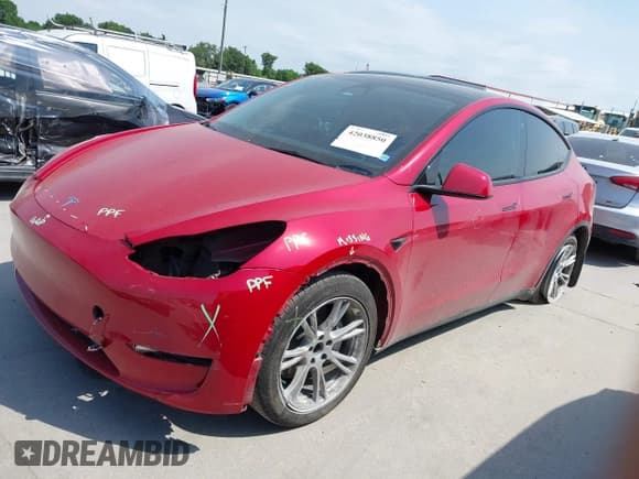 ✅ 2023 Tesla Model Y Long Range • VIN: 7SAYGAEE7PF691499 • Lot: 42038850. Listed on IAAI with 26,439 mi. Free auction sales archive from the USA and detailed vehicle history report at DreamBid. Image 2.