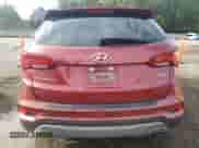 2017 Hyundai Santa Fe 2.4L z VIN 5XYZU3LB6HG471750, wystawiony jako Copart lot #81209935 z przebiegiem Nie podano mil oraz Szkoda całkowita • Salvage title. Historia ofert i sprzedaży dostępna na DreamBid. Obrazek 6.