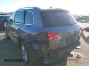 ✅ 2014 Volkswagen Touareg Sport • VIN: WVGEF9BPXED000845 • Lot: 43655040. Listed on IAAI with 107,278 mi. Free auction sales archive from the USA and detailed vehicle history report at DreamBid. Image 3.