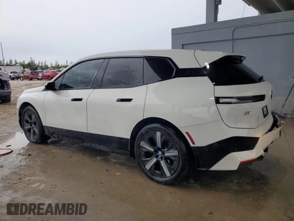 ✅ 2024 BMW iX xDrive50 • VIN: WB523CF04RCN04826 • Lot: 80787045. Listed on Copart with 58,223 mi. Free auction sales archive from the USA and detailed vehicle history report at DreamBid. Image 2.