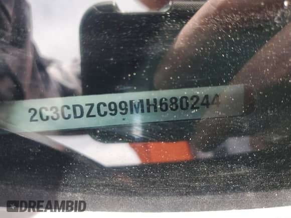 2021 Dodge Challenger SRT Hellcat with VIN 2C3CDZC99MH680244, listed as a Copart auction lot 56312265 with 30,057 mi miles and Salvage title. Bid and sale history available at DreamBid. Image 12.