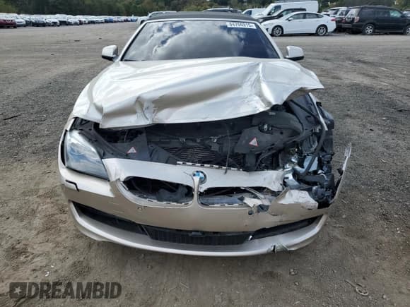 ✅ 2012 BMW 6 Series 650i • VIN: WBALZ3C5XCDL70734 • Лот: 84766915. Опубликован ранее на Copart с пробегом 133 641 миль. Бесплатный доступ к архиву аукционных продаж из США и подробный отчёт об истории автомобиля на DreamBid. Изображение 5.