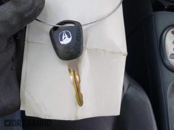 ✅ 2006 Acura RSX • VIN: JH4DC54806S015549 • Lot: 42742417. Listed on IAAI with 202,530 mi. Free auction sales archive from the USA and detailed vehicle history report at DreamBid. Image 11.