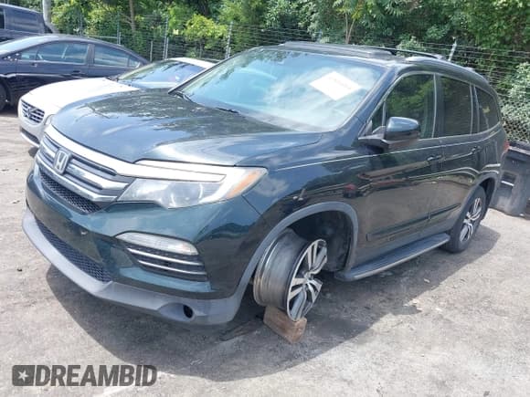✅ 2016 Honda Pilot EX-L • VIN: 5FNYF5H66GB008705 • Lot: 42806084. Wystawiony na IAAI z przebiegiem 168 753 mil. Bezpłatny archiwum sprzedaży aukcyjnych z USA i szczegółowy raport historii pojazdu na DreamBid. Zdjęcie 2.