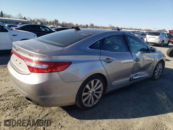 2013 Hyundai Azera с VIN KMHFH4JG8DA327554, выставлен на аукционе Copart как лот 87532485 с пробегом 82 164 миль миль и Списание • Salvage title. История ставок и продаж доступна на DreamBid. Изображение 3.