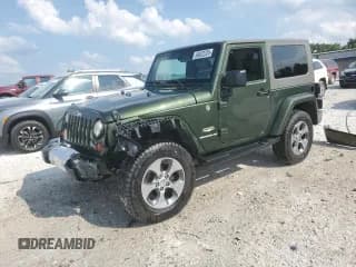 ✅ 2009 Jeep Wrangler Sahara • VIN: 1J8FA54159L751882 • Lot: 69022225. Listed on Copart with 110,131 mi. Free auction sales archive from the USA and detailed vehicle history report at DreamBid. Image 1.