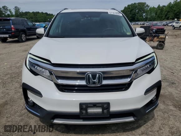 ✅ 2022 Honda Pilot Touring 8-Passenger • VIN: 5FNYF6H94NB016086 • Лот: 57161035. Опубликован ранее на Copart с пробегом 33 832 миль. Бесплатный доступ к архиву аукционных продаж из США и подробный отчёт об истории автомобиля на DreamBid. Изображение 5.