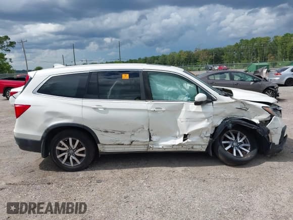 ✅ 2019 Honda Pilot EX-L • VIN: 5FNYF6H49KB067552 • Lot: 42718497. Listed on IAAI with 75,483 mi. Free auction sales archive from the USA and detailed vehicle history report at DreamBid. Image 13.