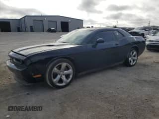 2012 Dodge Challenger SXT z VIN 2C3CDYAG0CH170553, wystawiony jako Copart lot #85912235 z przebiegiem 124 667 mil mil oraz Czysty tytuł • Clean title. Historia ofert i sprzedaży dostępna na DreamBid. Obrazek 1.