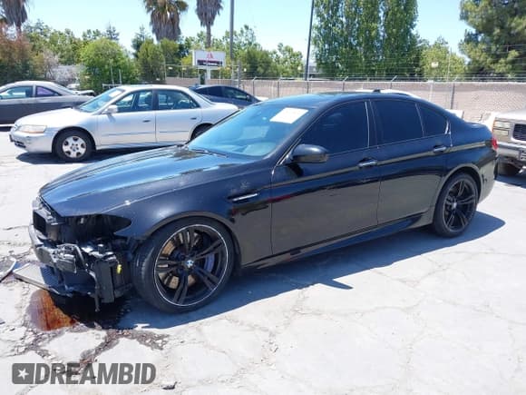 ✅ 2014 BMW M5 • VIN: WBSFV9C55ED097776 • Lot: 42551874. Wystawiony na IAAI z przebiegiem 125 036 mil. Bezpłatny archiwum sprzedaży aukcyjnych z USA i szczegółowy raport historii pojazdu na DreamBid. Zdjęcie 2.