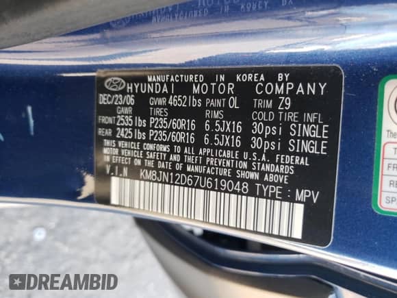 2007 Hyundai Tucson SE z VIN KM8JN12D67U619048, wystawiony jako Copart lot #81087214 z przebiegiem 110 562 mil mil oraz Szkoda całkowita • Salvage title. Historia ofert i sprzedaży dostępna na DreamBid. Obrazek 13.