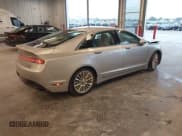 ✅ 2013 Lincoln MKZ • VIN: 3LN6L2J91DR805419 • Lot: 43565243. Listed on IAAI with 106,237 mi. Free auction sales archive from the USA and detailed vehicle history report at DreamBid. Image 4.