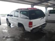 ✅ 2002 Chevrolet Tahoe LT • VIN: 1GNEC13Z92R235435 • Lot: 42764198. Listed on IAAI with 248,194 mi. Free auction sales archive from the USA and detailed vehicle history report at DreamBid. Image 3.