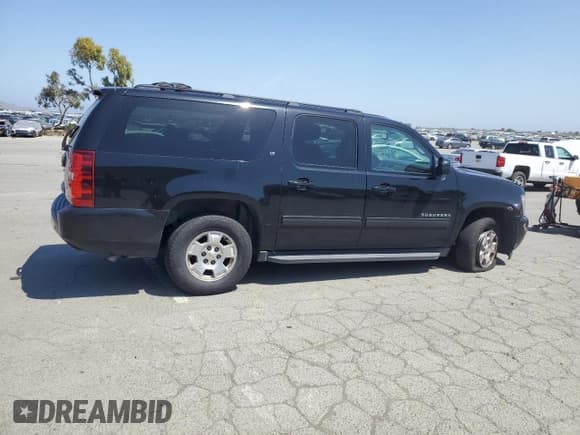 ✅ 2012 Chevrolet Suburban LT • VIN: 1GNSCJE0XCR303311 • Lot: 55284995. Listed on Copart with 488,654 mi. Free auction sales archive from the USA and detailed vehicle history report at DreamBid. Image 3.