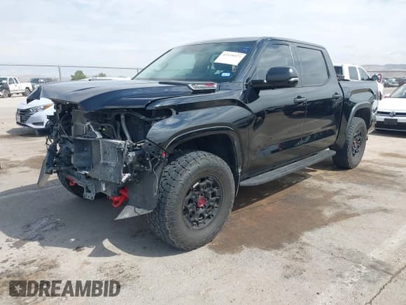 ✅ 2023 Toyota Tundra TRD Pro Hybrid • VIN: 5TFPC5DB0PX014643 • Лот: 43379377. Опубликован ранее на IAAI с пробегом 5 184 миль. Бесплатный доступ к архиву аукционных продаж из США и подробный отчёт об истории автомобиля на DreamBid. Изображение 2.