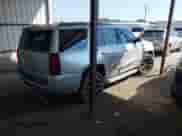 2015 Chevrolet Tahoe LT with VIN 1GNSCBKC2FR500868, listed as a IAAI auction lot 43368598 with 212,885 mi miles and . Bid and sale history available at DreamBid. Image 4.