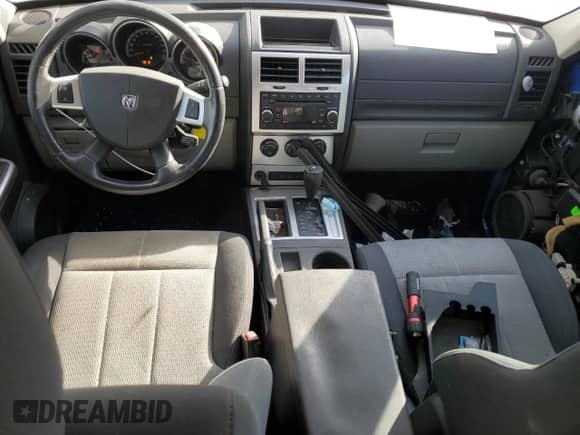 2007 Dodge Nitro SLT с VIN 1D8GT58K17W736706, выставлен на аукционе Copart как лот 76748134 с пробегом 147 983 миль миль и Списание • Salvage title. История ставок и продаж доступна на DreamBid. Изображение 8.