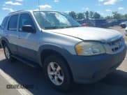 ✅ 2006 Mazda Tribute i • VIN: 4F2YZ02Z86KM08764 • Lot: 43079690. Listed on IAAI with 207,691 mi. Free auction sales archive from the USA and detailed vehicle history report at DreamBid. Image 1.