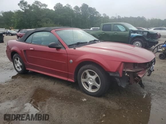 ✅ 2004 Ford Mustang Deluxe • VIN: 1FAFP44654F207066 • Lot: 54219185. Listed on Copart with 137,820 mi. Free auction sales archive from the USA and detailed vehicle history report at DreamBid. Image 4.
