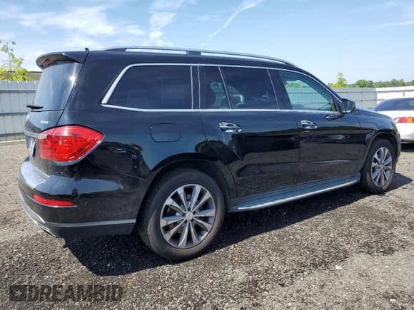 ✅ 2015 Mercedes-Benz GL 450 • VIN: 4JGDF6EE5FA452404 • Лот: 65478405. Опубликован ранее на Copart с пробегом 143 897 миль. Бесплатный доступ к архиву аукционных продаж из США и подробный отчёт об истории автомобиля на DreamBid. Изображение 3.