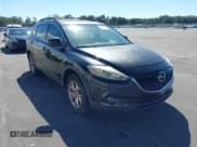 ✅ 2015 Mazda CX-9 Touring • VIN: JM3TB2CA4F0448541 • Lot: 43502816. Wystawiony na IAAI z przebiegiem 104 182 mil. Bezpłatny archiwum sprzedaży aukcyjnych z USA i szczegółowy raport historii pojazdu na DreamBid. Zdjęcie 1.