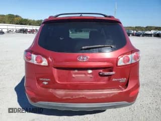 ✅ 2011 Hyundai Santa Fe Limited • VIN: 5XYZK4AG2BG052523 • Лот: 82400975. Опубликован ранее на Copart с пробегом 142 072 миль. Бесплатный доступ к архиву аукционных продаж из США и подробный отчёт об истории автомобиля на DreamBid. Изображение 6.