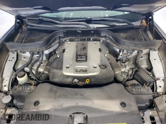 ✅ 2015 Infiniti QX70 • VIN: JN8CS1MW1FM480891 • Lot: 86780525. Listed on Copart with 122,309 mi. Free auction sales archive from the USA and detailed vehicle history report at DreamBid. Image 12.