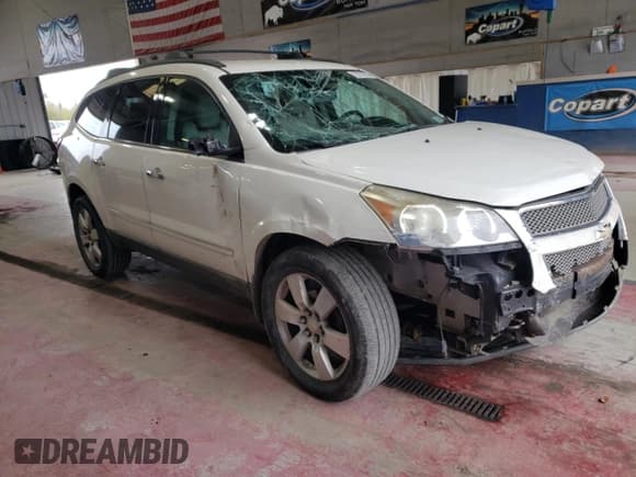 ✅ 2012 Chevrolet Traverse LTZ • VIN: 1GNKVLED6CJ319125 • Lot: 73757614. Wystawiony na Copart z przebiegiem 184 410 mil. Bezpłatny archiwum sprzedaży aukcyjnych z USA i szczegółowy raport historii pojazdu na DreamBid. Zdjęcie 4.