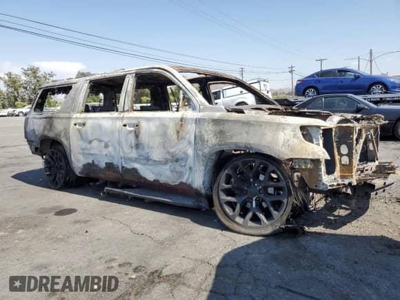 2016 Chevrolet Suburban LT with VIN 1GNSCHKC2GR279258, listed as a Copart auction lot 65976524 with Not provided miles and Non repairable. Bid and sale history available at DreamBid. Image 4.