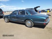 ✅ 1993 Jaguar XJ • VIN: SAJHW1742PC673446 • Лот: 71095615. Опубликован ранее на Copart с пробегом 157 592 миль. Бесплатный доступ к архиву аукционных продаж из США и подробный отчёт об истории автомобиля на DreamBid. Изображение 2.