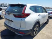 ✅ 2020 Honda CR-V LX • VIN: 5J6RW1H27LA008770 • Lot: 42872314. Listed on IAAI with 14,218 mi. Free auction sales archive from the USA and detailed vehicle history report at DreamBid. Image 4.