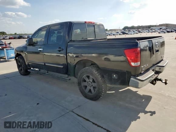 ✅ 2004 Nissan Titan LE • VIN: 1N6AA07AX4N543992 • Лот: 67039905. Опубликован ранее на Copart с пробегом 144 789 миль. Бесплатный доступ к архиву аукционных продаж из США и подробный отчёт об истории автомобиля на DreamBid. Изображение 2.
