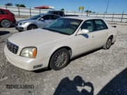 ✅ 2003 Cadillac DeVille DHS • VIN: 1G6KE54YX3U190879 • Lot: 57874555. Listed on Copart with 180,129 mi. Free auction sales archive from the USA and detailed vehicle history report at DreamBid. Image 1.