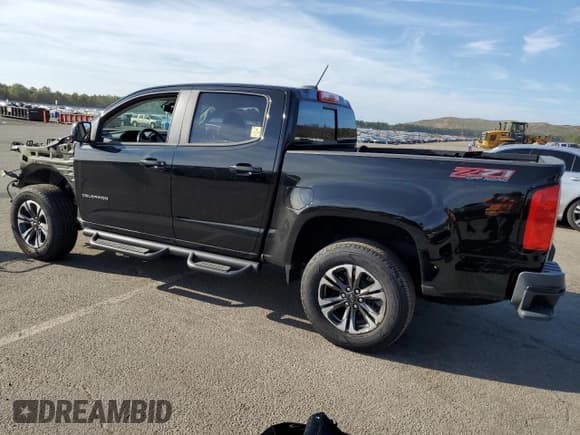 ✅ 2021 Chevrolet Colorado 4WD Z71 • VIN: 1GCGTDEN3M1142862 • Лот: 71504164. Опубликован ранее на Copart с пробегом 34 617 миль. Бесплатный доступ к архиву аукционных продаж из США и подробный отчёт об истории автомобиля на DreamBid. Изображение 2.