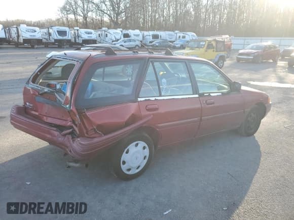 ✅ 1996 Ford Escort LX • VIN: 1FASP15J7TW112703 • Лот: 84905564. Опубликован ранее на Copart с пробегом 119 575 миль. Бесплатный доступ к архиву аукционных продаж из США и подробный отчёт об истории автомобиля на DreamBid. Изображение 3.