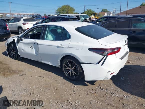 2023 Toyota Camry SE with VIN 4T1G11BK4PU075573, listed as a IAAI auction lot 43182696 with 36,287 mi miles and . Bid and sale history available at DreamBid. Image 3.