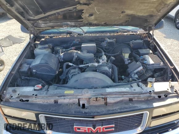 ✅ 1998 GMC Sierra 1500 • VIN: 2GTEK19R6W1553174 • Лот: 71101985. Опубликован ранее на Copart с пробегом 164 198 миль. Бесплатный доступ к архиву аукционных продаж из США и подробный отчёт об истории автомобиля на DreamBid. Изображение 11.