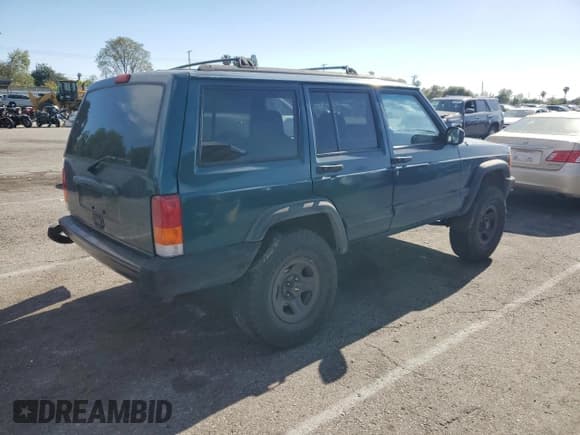 ✅ 1997 Jeep Cherokee Sport • VIN: 1J4FT68S4VL545385 • Лот: 49616325. Опубликован ранее на Copart с пробегом 239 798 миль. Бесплатный доступ к архиву аукционных продаж из США и подробный отчёт об истории автомобиля на DreamBid. Изображение 3.