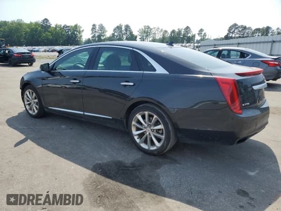 ✅ 2014 Cadillac XTS Luxury • VIN: 2G61M5S38E9132386 • Lot: 57744985. Listed on Copart with 130,940 mi. Free auction sales archive from the USA and detailed vehicle history report at DreamBid. Image 2.
