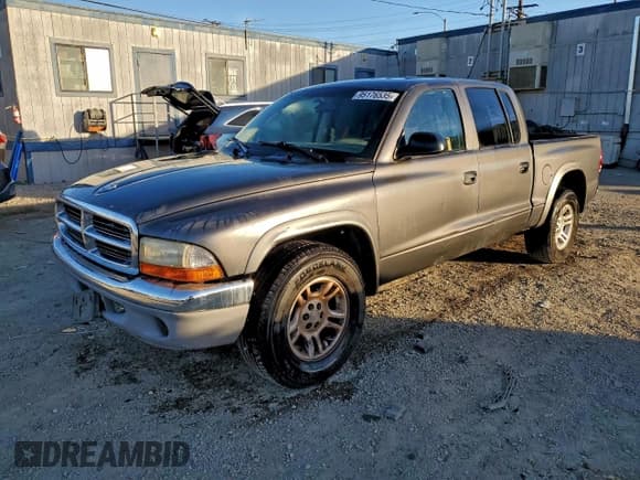 ✅ 2004 Dodge Dakota SLT • VIN: 1D7HL48N14S717640 • Lot: 95176535. Listed on Copart with 131,161 mi. Free auction sales archive from the USA and detailed vehicle history report at DreamBid. Image 1.