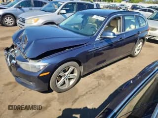 ✅ 2015 BMW 3 Series 328i xDrive • VIN: WBA3G7C52FK297730 • Lot: 70357125. Listed on Copart with 165,129 mi. Free auction sales archive from the USA and detailed vehicle history report at DreamBid. Image 1.