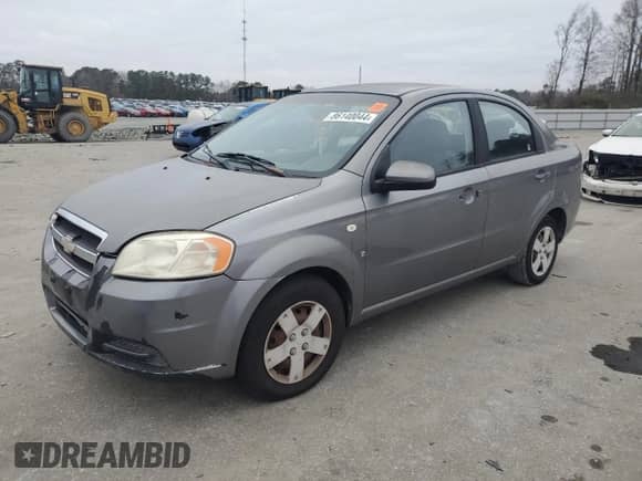2007 Chevrolet Aveo LS z VIN KL1TD56637B061892, wystawiony jako Copart lot #86140044 z przebiegiem Nie podano mil oraz Szkoda całkowita • Salvage title. Historia ofert i sprzedaży dostępna na DreamBid. Obrazek 1.